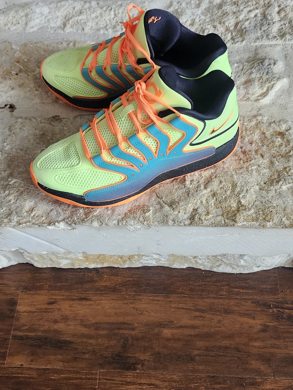 KD's Nike Yellow, Orange, and Neon Blue with Orange Embroidery